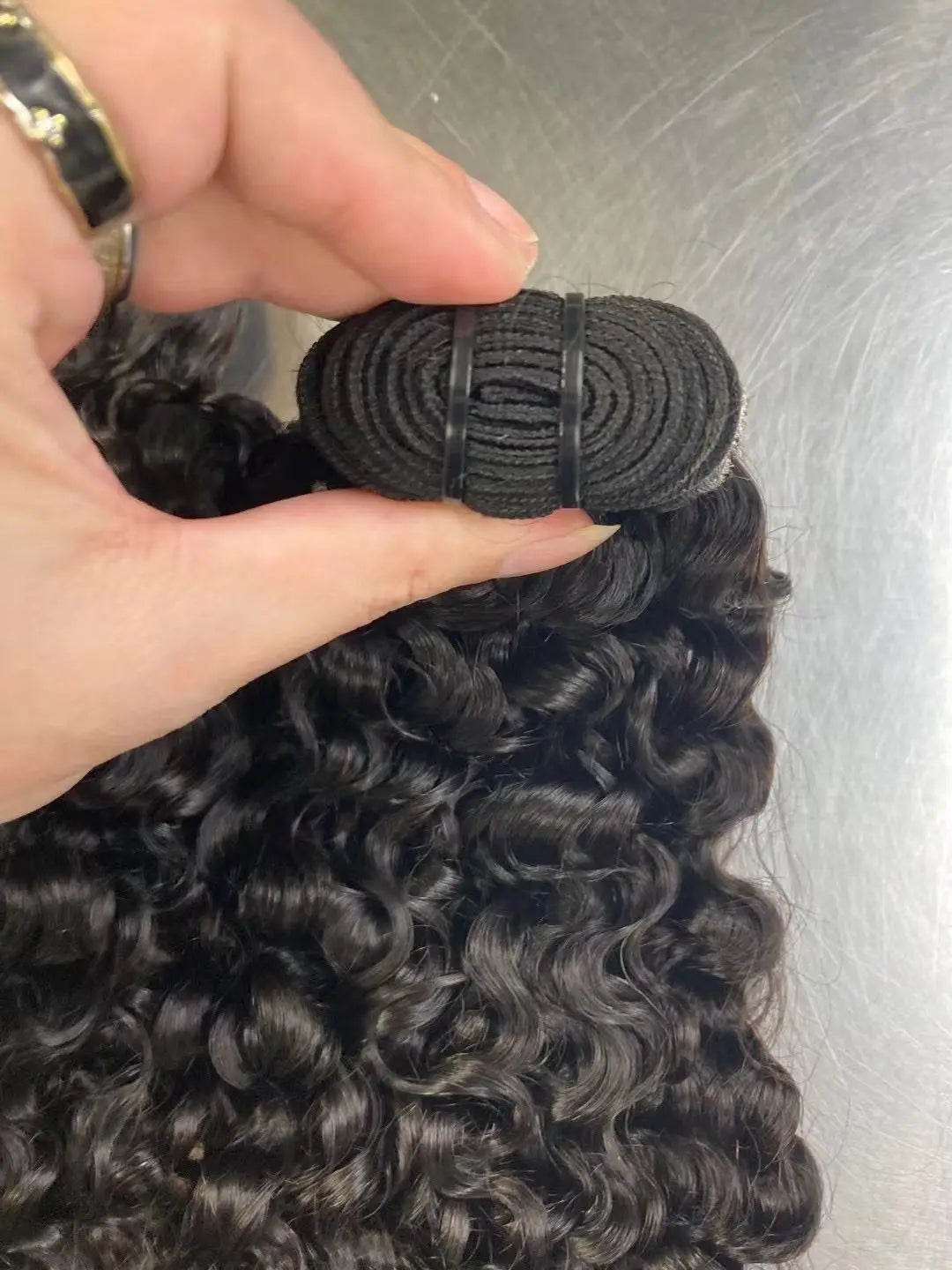 Unprocessed Raw Burmese Curly Bundles.